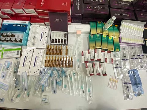 The Dubai Police confiscated medical substances and equipment used in cosmetic surgeries from a 'fake' woman plastic surgeon. ,