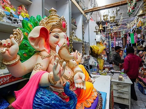 Idols of the Hindu deity Ganesha on display at shops near the temple in Bur Dubai.