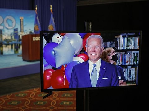 Joe Biden is displayed on a video monitor 