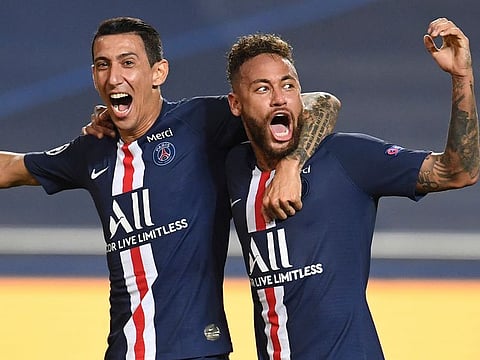 Angel Di Maria, left, celebrates after scoring his side’s second goal with Neymar.