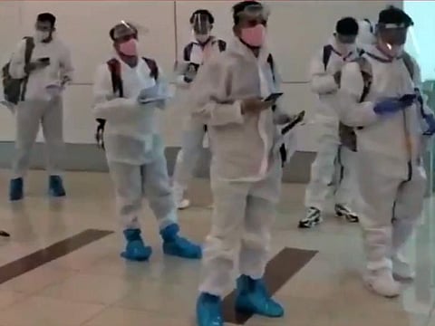 Rajasthan Royals players make their way through the terminal in Dubai on Thursday.