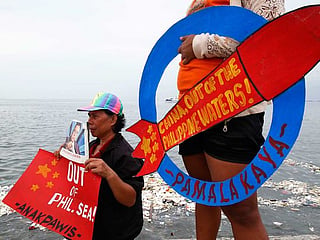 Philippines protests China actions vs. fishermen, aircraft