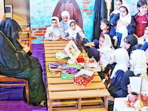 Children learn about heritage at an interactive session organised by the Sharjah Heritage Institute.