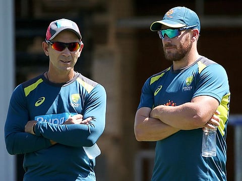 Justin Langer and Aaron Finch