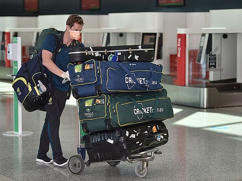 Steve Smith heads for his flight to England at Sydney Airport