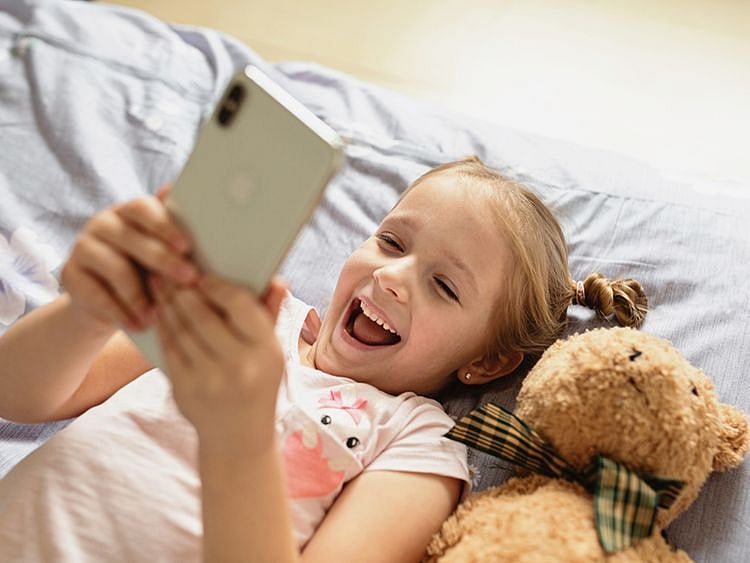 Toddler using smartphone