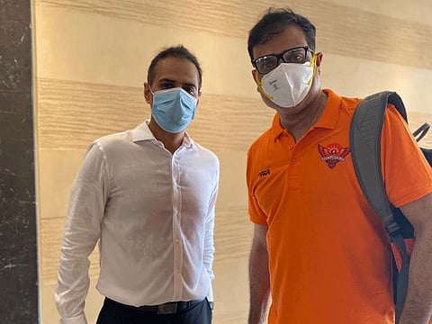 VVS Laxman (right) on his arrival at the team hotel in Dubai on Sunday.