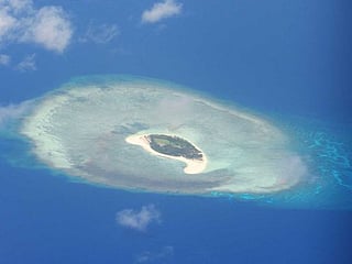 Philippines 'seriously concerned' over China's reclaimed land in disputed sea