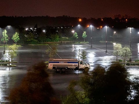 A single truck is parked in an open lot as heavy rains from hurricane Laura fall in Lake Charles, Louisiana on August 26, 2020. Hurricane Laura hit the coast of the southern US states of Louisiana and Texas on August 26 as a monster Category 4 storm, prompting warnings of "unsurvivable" storm surge and evacuation orders for hundreds of thousands of Gulf Coast residents.