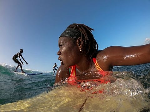 Senegal's first female pro surfer draws others in her wake