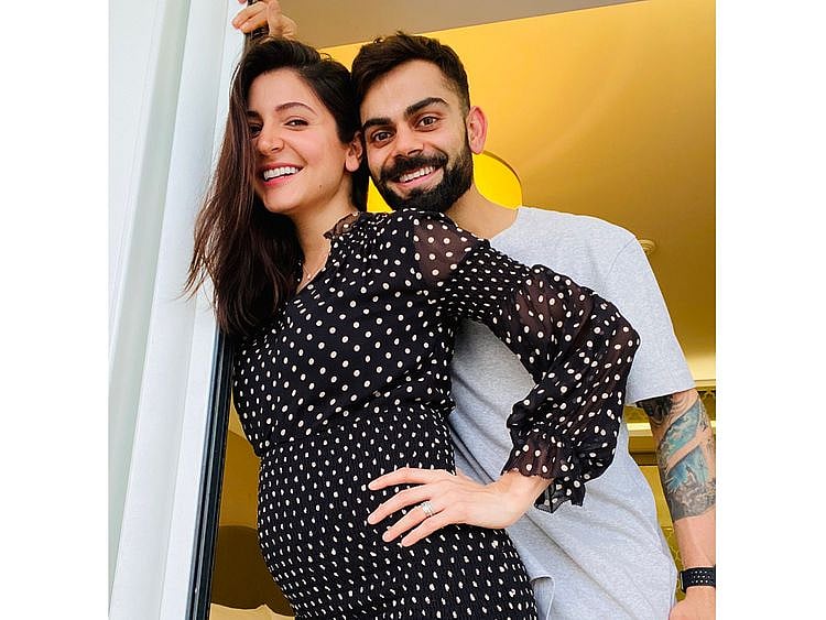 Virat Kohli and wife Anushka Sharma show off the bump