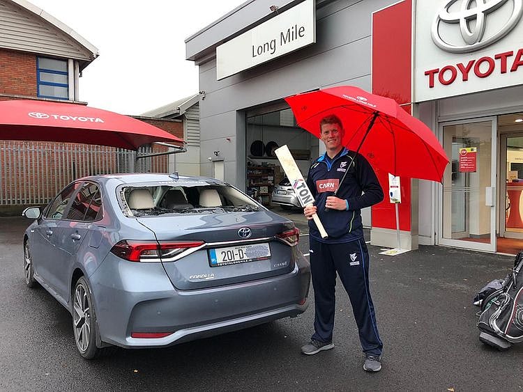 Kevin O'Brien with his damaged car