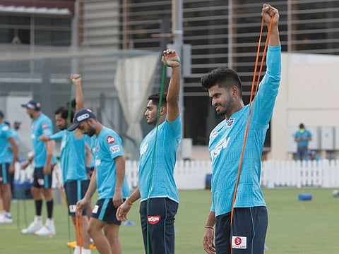 Delhi Capitals captain Shreyas Iyer (extreme right) goes though drill with his teammates at the ICC Academy.