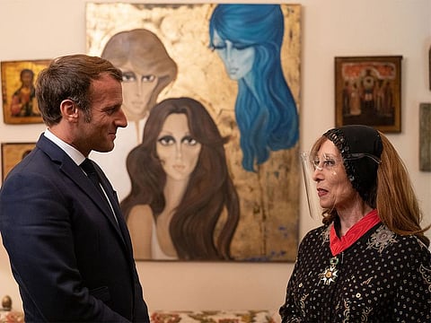 Macron meets with Lebanon's diva Fairuz, one of the Arab world's most popular singers, in Rabieh, north Beirut on August 31, 2020. 