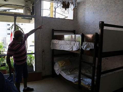 Nadim Srour, a 43-year-old who returned from the Gulf, points to the damaged at his home which was affected due to the massive explosion at Beirut's port area, in Beirut, Lebanon August 26.