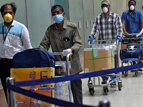 Passengers arriving at the international airport in Chennai.