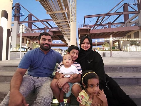 Crash victims Sahira Banu and her son Azam Muhammed with other family members.