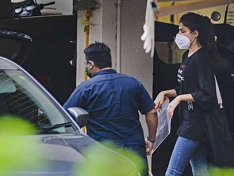 Bollywood actress Rhea Chakraborty leaves for NCB office after being summoned in connection with late actor Sushant Singh Rajput's death by suicide case, at Santacruz in Mumbai, Tuesday, September 8, 2020.