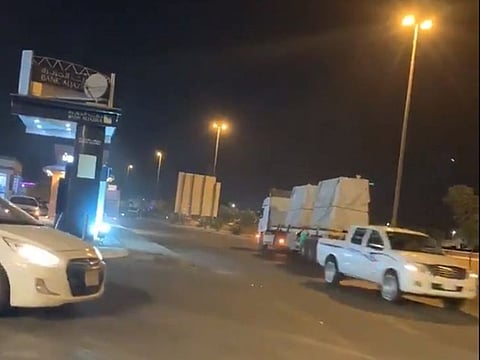 Saudi trucker drives against the traffic.