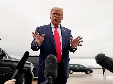 US President Donald Trump speaks to the media before boarding Air Force One for a trip to a campaign rally on September 10, 2020.