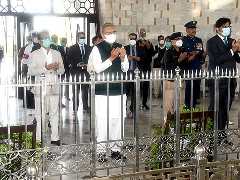 President Dr. Arif Alvi prays at the mausoleum of founder of Pakistan Quaid-e-Azam Mohammad Ali Jinnah.