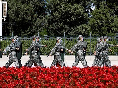 Soldiers of the People's Liberation Army (PLA) march outside the Great Hall of the People in Beijing, China September 8, 2020. 