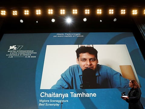 Director Chaitanya Tamhane wins the award for Best Screenplay.