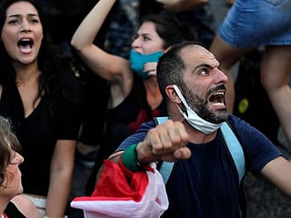 Photos: Lebanese rally near presidential palace to demand justice over port blast