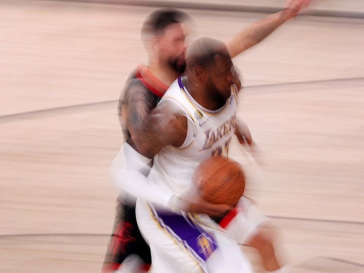 LeBron James of the Los Angeles Lakers drives to the basket against the Houston Rockets in Game Five of the Western Conference semi-finals.
