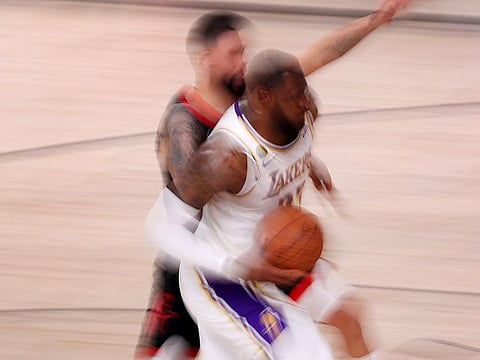 LeBron James of the Los Angeles Lakers drives to the basket against the Houston Rockets in Game Five of the Western Conference semi-finals.