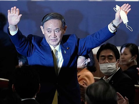 Japanese Chief Cabinet Secretary Yoshihide Suga acknowledges as he is elected as new head of Japan's ruling party at the Liberal Democratic Party's (LDP) leadership election Monday, Sept. 14, 2020, in Tokyo.
