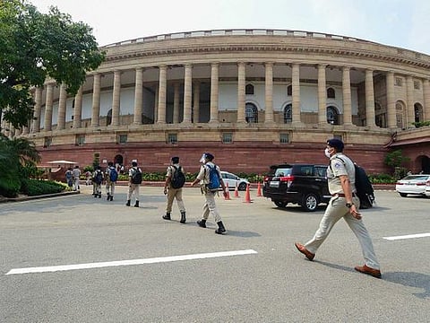 Security personnel at Parliament House on the opening day of Monsoon Session, in New Delhi, Monday, Sept. 14, 2020