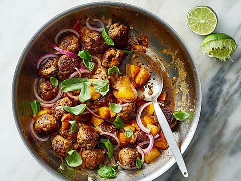 Skillet meatballs with peaches, basil and lime.