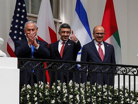 Israel's Prime Minister Benjamin Netanyahu, Sheikh Abdullah Bin Zayed Al Nahyan, UAE Minister of Foreign Affairs and International Cooperation and Bahrain’s Foreign Minister Abdullatif Al Zayani standby prior to signing the Abraham Accords  at the White House 