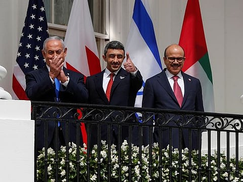 In this file image Israel's Prime Minister Benjamin Netanyahu, Sheikh Abdullah Bin Zayed Al Nahyan, UAE Minister of Foreign Affairs and International Cooperation and Bahrain’s Foreign Minister Abdullatif Al Zayani standby prior to signing the Abraham Accords at the White House in Washington, US