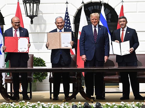 From left: Bahrain Foreign Minister Abdullatif al-Zayani, Israeli Prime Minister Benjamin Netanyahu, US President Donald Trump, and UAE Foreign Minister Abdullah bin Zayed Al-Nahyan after signing the Abraham Accords at the White House in Washington, DC, September 15, 2020. 