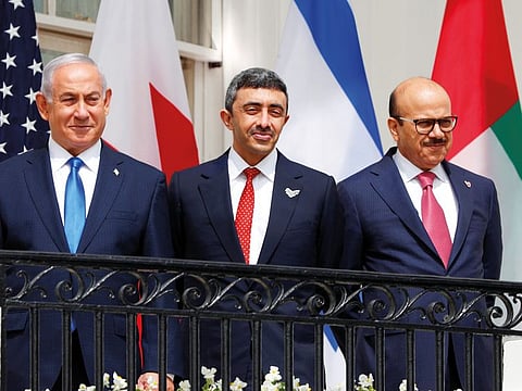 Israeli Prime Minister Benjamin Netanyahu, UAE Foreign Minister Abdullah Bin Zayed Al Nahyan, and Bahraini Foreign Minister Abdullatif Al Zayani at the signing of the peace treaty at White House in Washington 