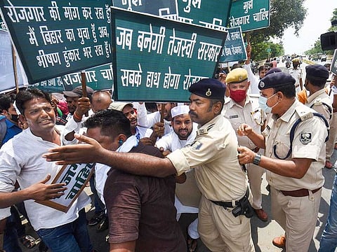 Police intervene during a rally held outside the JD-U office in Patna. The election affidavits filed by several candidates before the Election Commission show they are getting younger by the day.