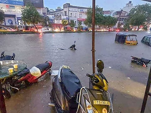Vehicles submerged on waterlogged Mehdipatnam to Tolichowki road after heavy rain, in Hyderabad, Wednesday, Sept. 16, 2020.
