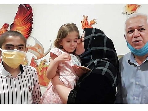 Iraqi teenager Ahmed with his family after the bone marrow transplantation. Ahmed underwent bone marrow transplantation to fight sickle cell disease, with his three-year-old sister acting as donor.