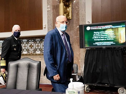 Robert Redfield, the Centres for Disease Control and Prevention director, testifies on Capitol Hill in Washington, Sept. 16, 2020. A controversial guideline saying that people without COVID-19 symptoms didn’t need to get tested was reportedly not written by CDC scientists, and was posted to the CDC’s website in August by Health and Human Services officials. 