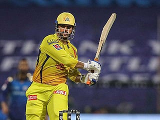 CSK Skipper MS Dhoni plays a shot against Mumbai Indians during the first match of IPL 2020 at Sheikh Zayed Stadium in Abu Dhabi, UAE on September 19, 2020.