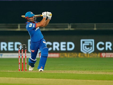 Marcus Stoinis of Delhi Capitals hits a six in the match against Kings XI Punjab in IPL 2020 at the Dubai International Cricket Stadium on Sunday.
