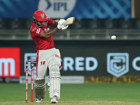 Mayank Agarwal of Kings XI Punjab hits a boundary. 