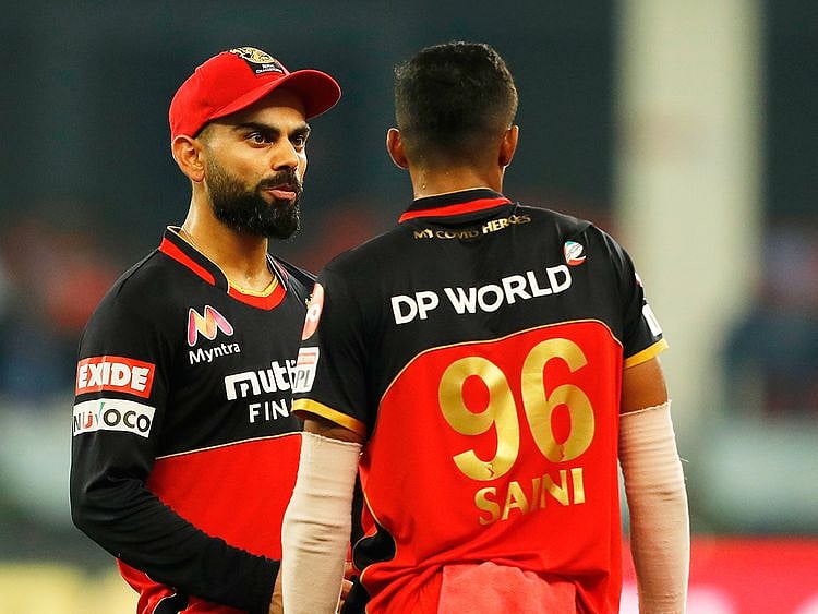 Bangalore skipper Virat Kohli chatting with pacer Navdeep Saini. 