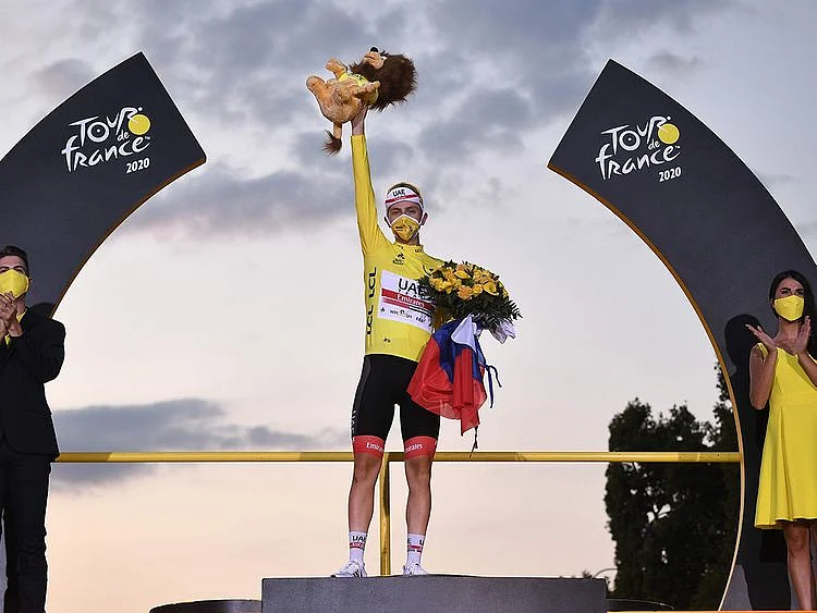 Tadej Pogacar celebrates his Tour de France win