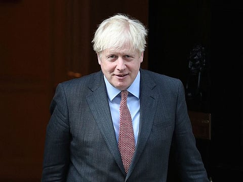 Britain's Prime Minister Boris Johnson leaves 10 Downing Street, London, Monday Sept. 21, 2020. 