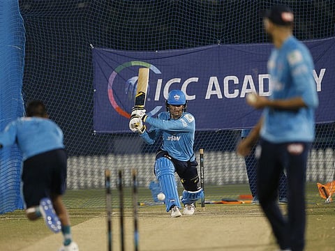 Alex Carey, Delhi Capitals' Australian wicketkeeper-batsman, attempts a reverse sweep at the nets in Dubai.