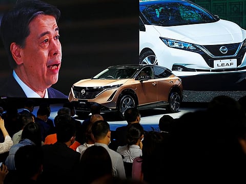 Nissan Chief Executive Officer Makoto Uchida speaks at Nissan booth via video link during the presentation of Nissan's Ariya model during the Beijing International Automotive Exhibition, or Auto China show, in Beijing.