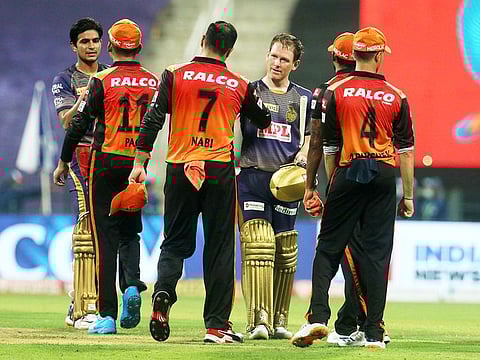 Players of Kolkata Knight Riders and Sunrisers Hyderabad greet each other after the match.  